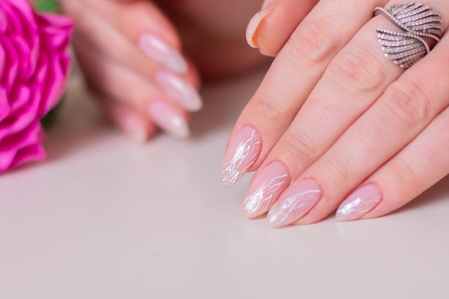 Read more about the article Classic Manicure – A timeless choice that includes nail shaping, cuticle care, a soothing hand massage, and a perfect polish application.